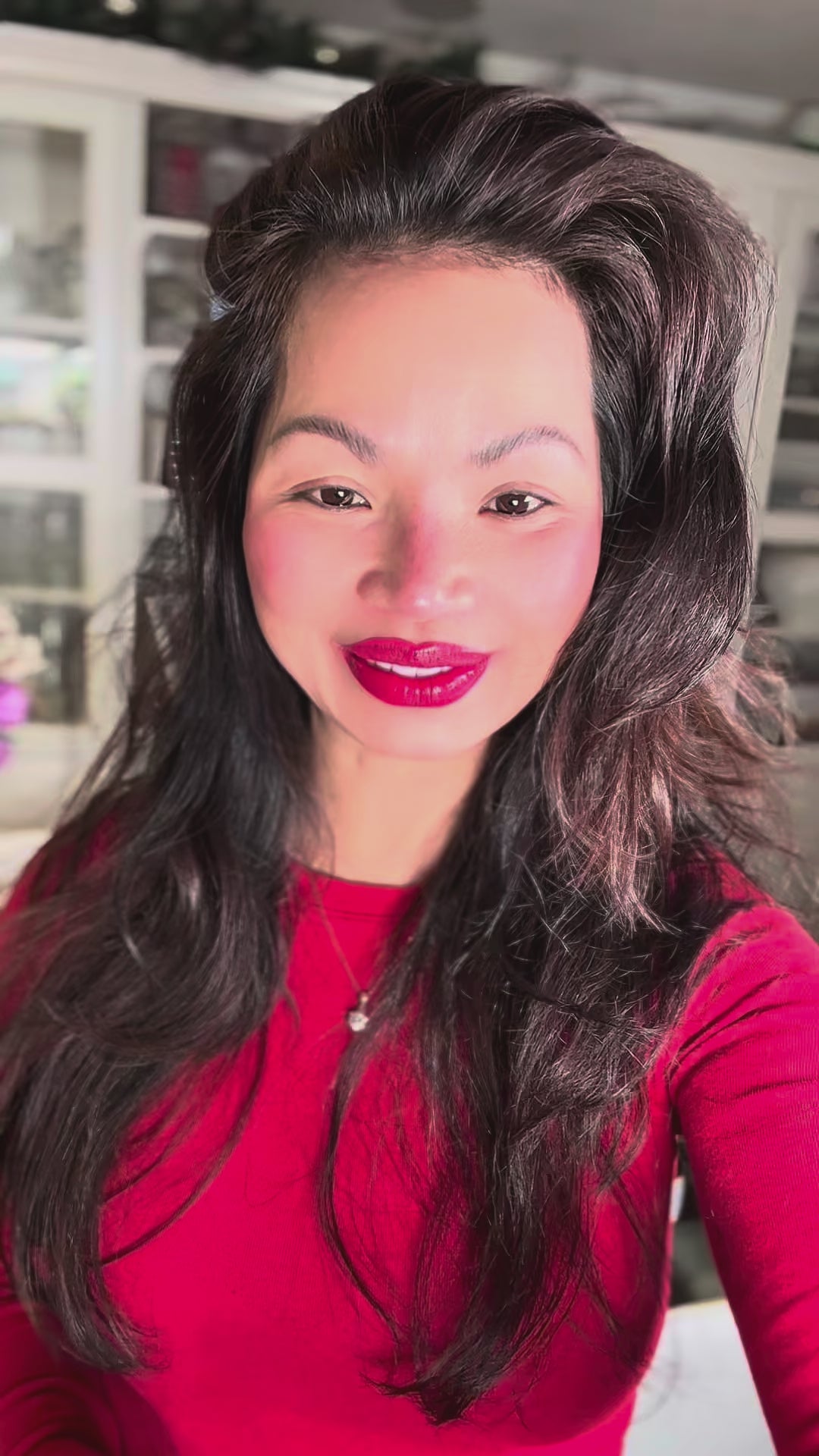 Founder Melinda applying ME-Lips™ 4-in-1 Unique Pink-Red Tint, a color-adapting lip and cheek butter, as part of her quick, natural morning makeup routine.